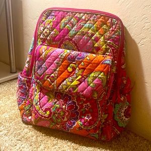 This is a floral Vera Bradley backpack and pencil pouch.